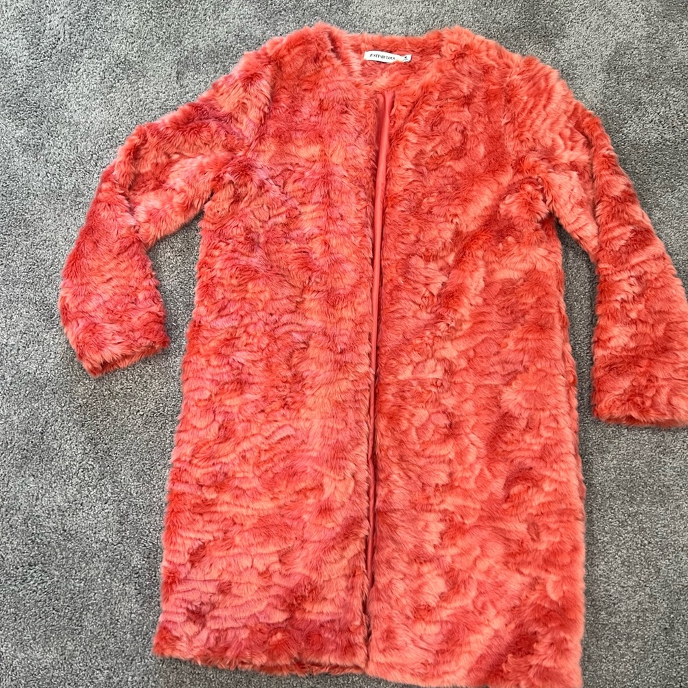 Long thigh length fur trench jacket